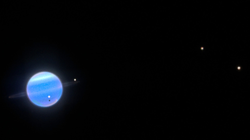  Surprised scientists discover the 'dark sides' of Uranus' moons are the wrong way around 